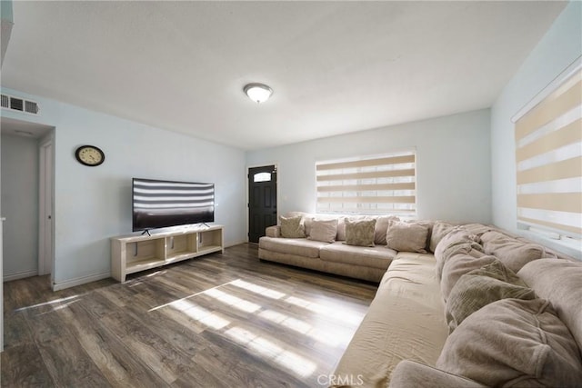 living room featuring dark hardwood / wood-style floors