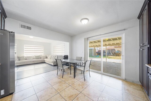 dining room with light tile patterned floors