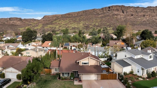 drone / aerial view featuring a mountain view