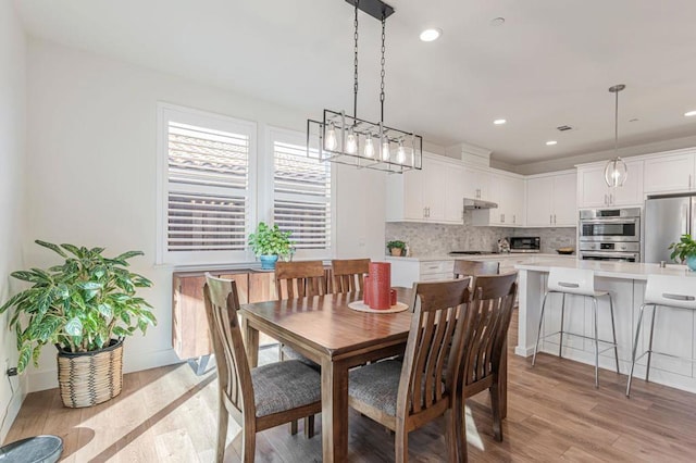 dining area featuring light hardwood / wood-style flooring