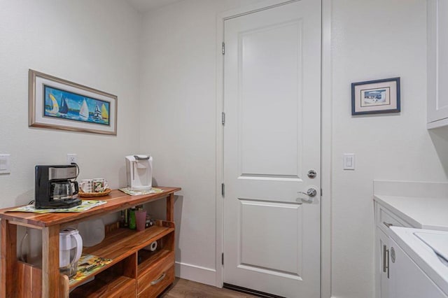 doorway with hardwood / wood-style floors