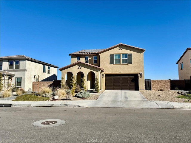 view of front of property with a garage