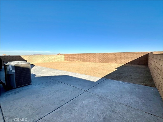 view of patio with central AC