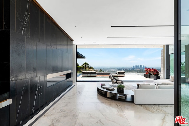 living room with floor to ceiling windows