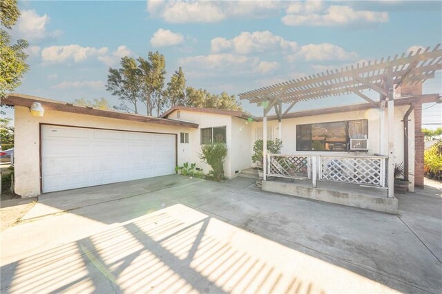 ranch-style home featuring a garage