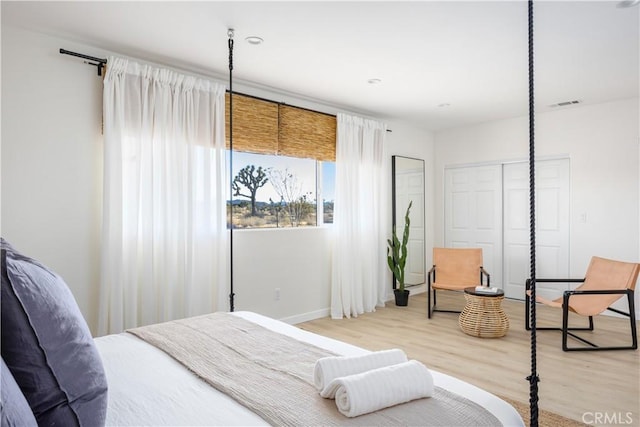 bedroom featuring light wood-type flooring