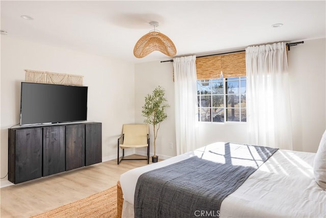 bedroom featuring light hardwood / wood-style floors