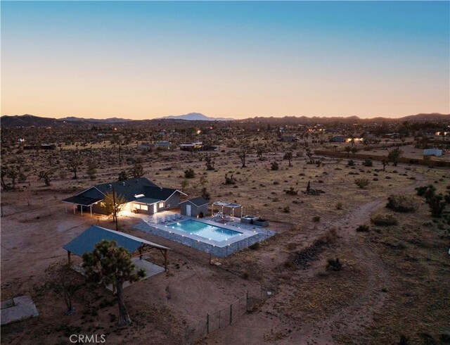 aerial view at dusk with a mountain view