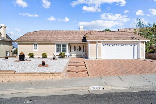 ranch-style house with a garage