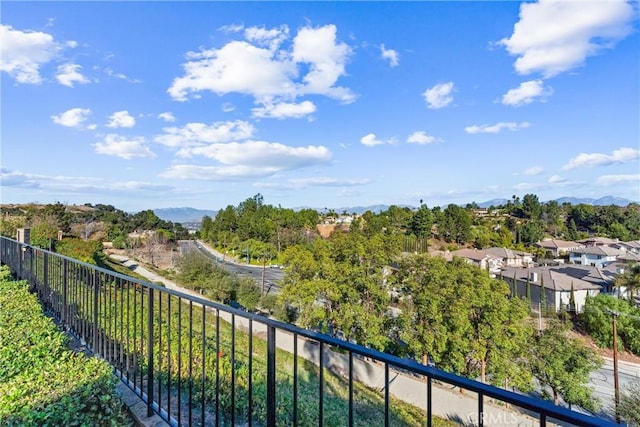 balcony featuring a mountain view