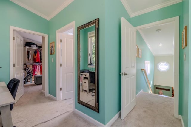 hall featuring light colored carpet, vaulted ceiling, and crown molding