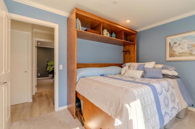 carpeted bedroom featuring ornamental molding