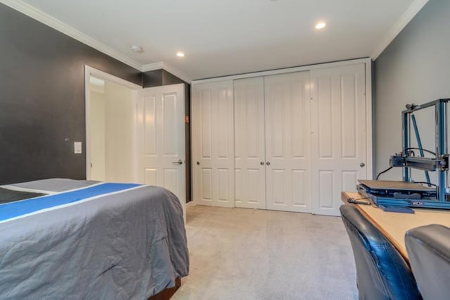 bedroom featuring light carpet, a closet, and ornamental molding