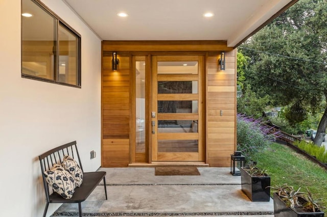 doorway to property featuring a porch