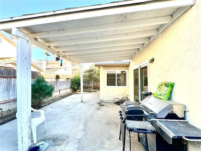 view of patio featuring a grill