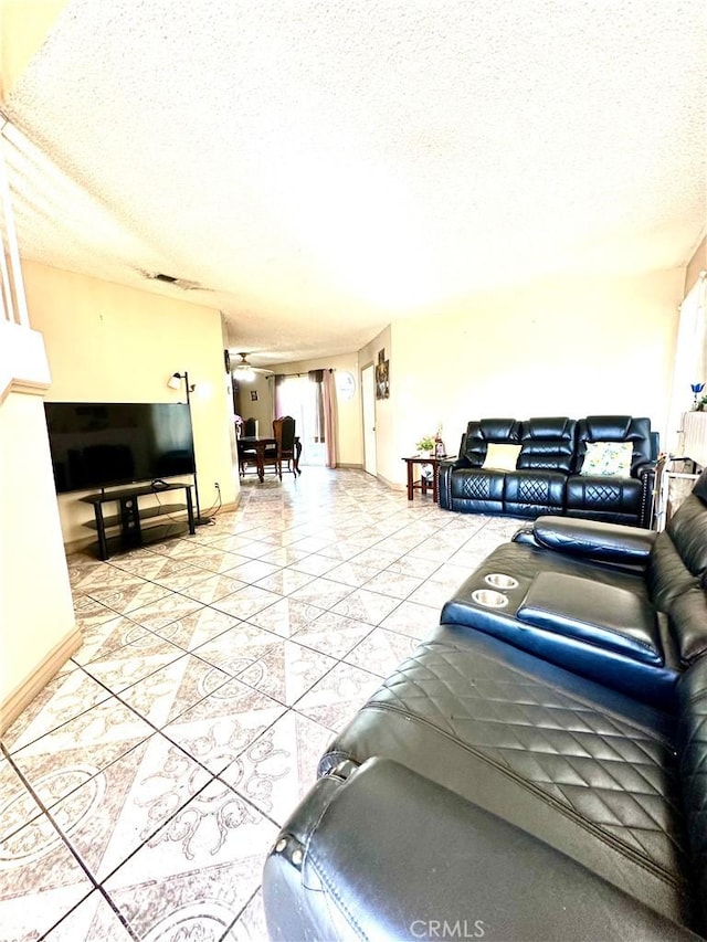 living room with a textured ceiling