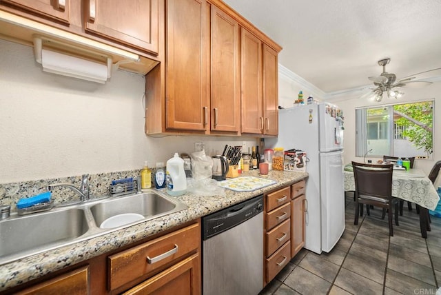 kitchen featuring ceiling fan, stainless steel dishwasher, sink, light stone countertops, and white refrigerator