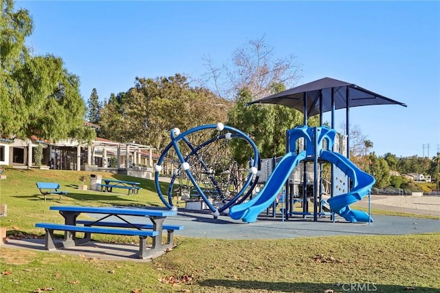 view of jungle gym featuring a yard