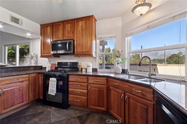 kitchen with sink and black appliances