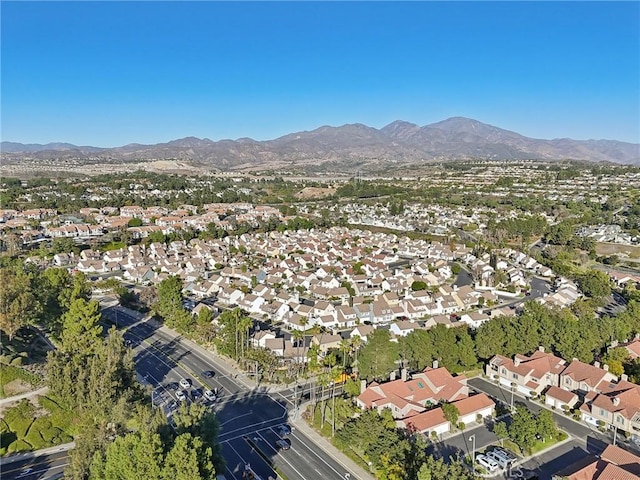 drone / aerial view featuring a mountain view