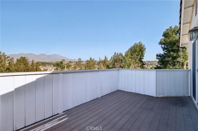 wooden terrace with a mountain view