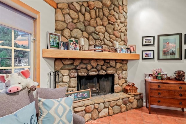 interior space with a stone fireplace