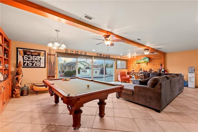 recreation room with ceiling fan, billiards, beam ceiling, light tile patterned flooring, and wooden walls