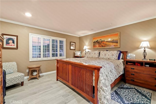 bedroom featuring light hardwood / wood-style flooring and ornamental molding