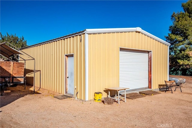 view of outdoor structure with a garage