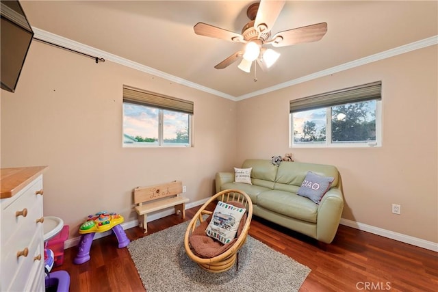 living room featuring dark wood-type flooring, crown molding, and ceiling fan