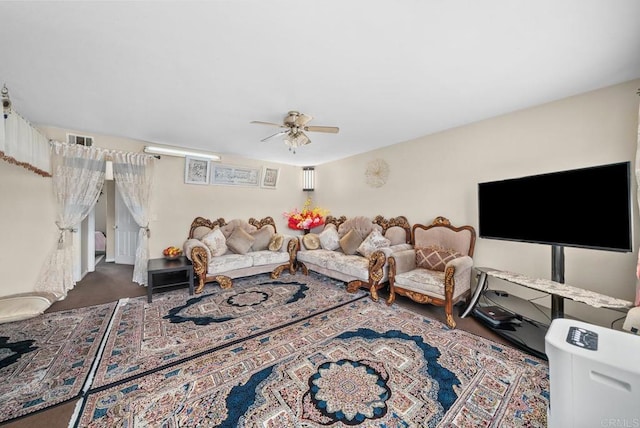 living room featuring ceiling fan