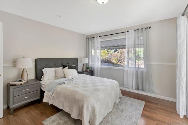 bedroom featuring wood-type flooring