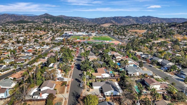 drone / aerial view featuring a mountain view