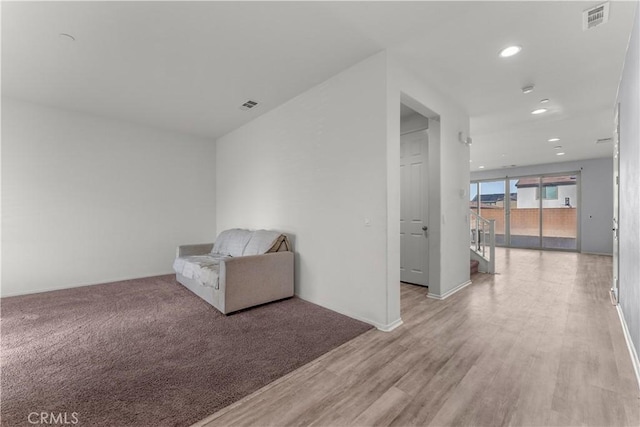 unfurnished room with light hardwood / wood-style floors