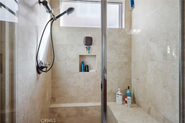 bathroom with walk in shower