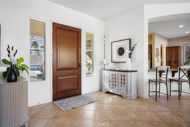 entryway featuring light tile patterned floors