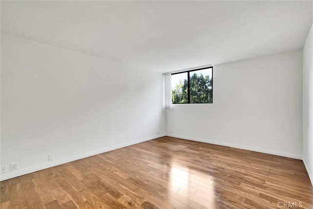 empty room featuring light hardwood / wood-style floors