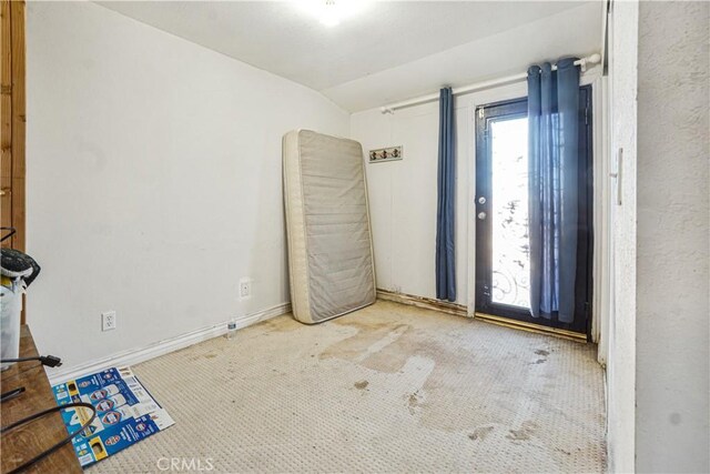 interior space with vaulted ceiling