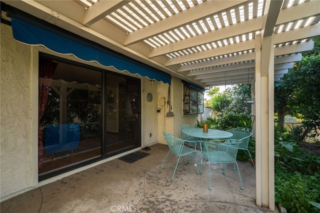 view of patio / terrace featuring a pergola