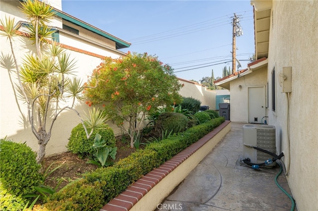 exterior space featuring a patio area and central AC