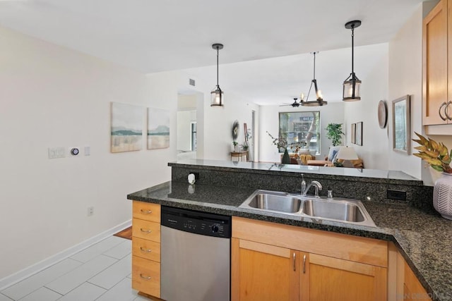 kitchen with sink, hanging light fixtures, ceiling fan, light tile patterned floors, and stainless steel dishwasher