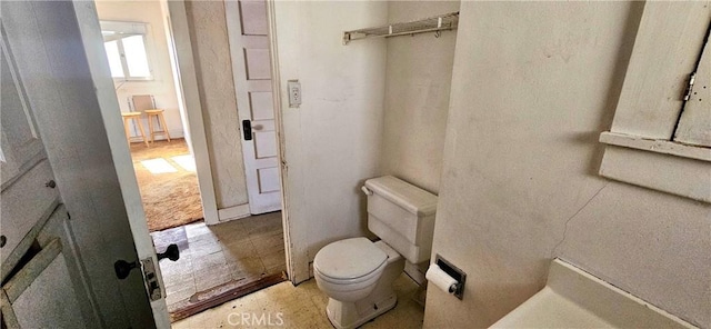 bathroom featuring toilet