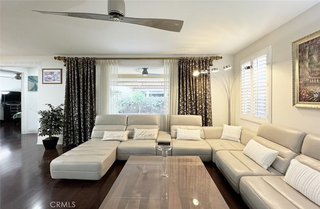 living area with ceiling fan and wood finished floors