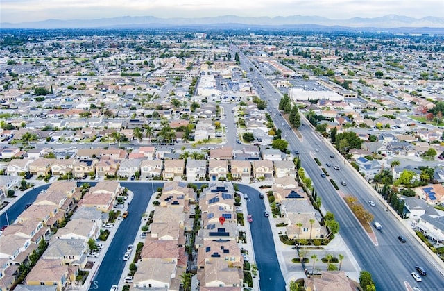 aerial view with a mountain view and a residential view