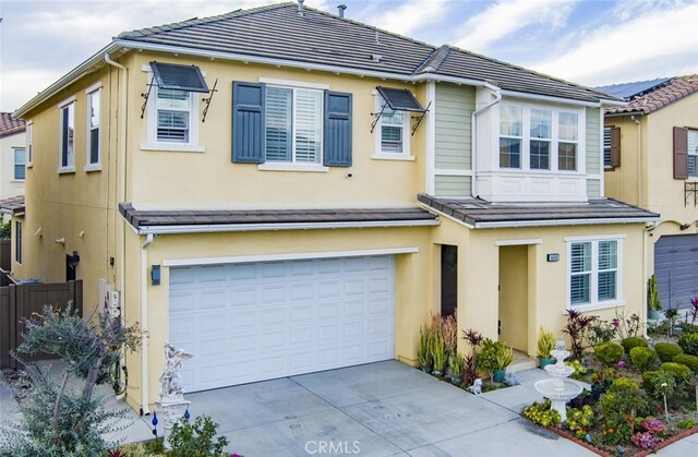 view of front of home featuring a garage