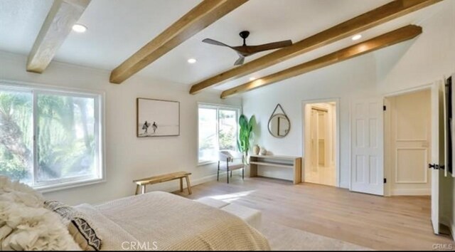 bedroom featuring light wood-type flooring, ceiling fan, and lofted ceiling with beams