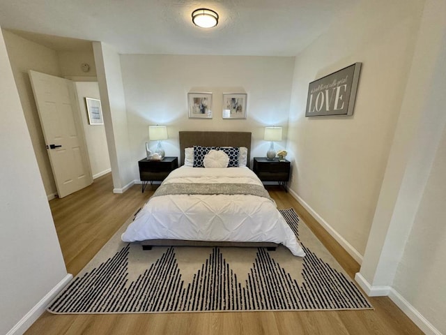 bedroom featuring light wood-type flooring