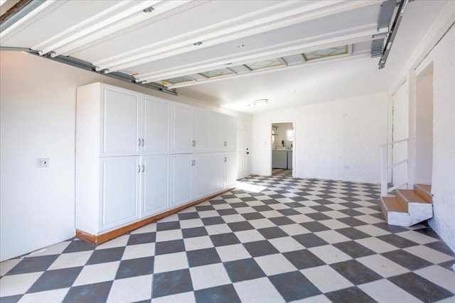 garage featuring washer / dryer