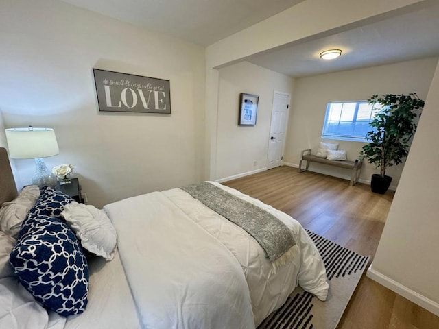 bedroom featuring hardwood / wood-style flooring