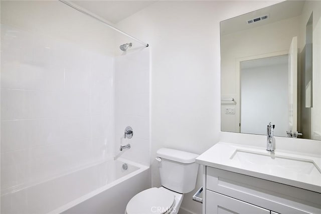 full bathroom with vanity, toilet, and tiled shower / bath combo